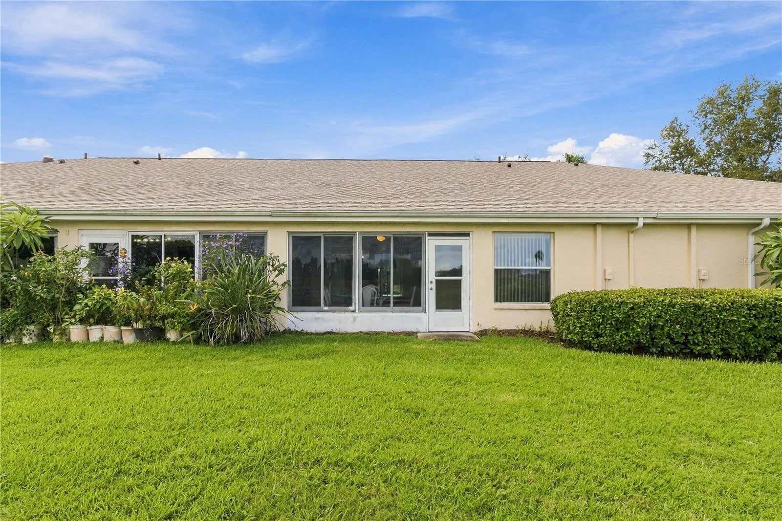 Generously sized backyard with plenty of space t