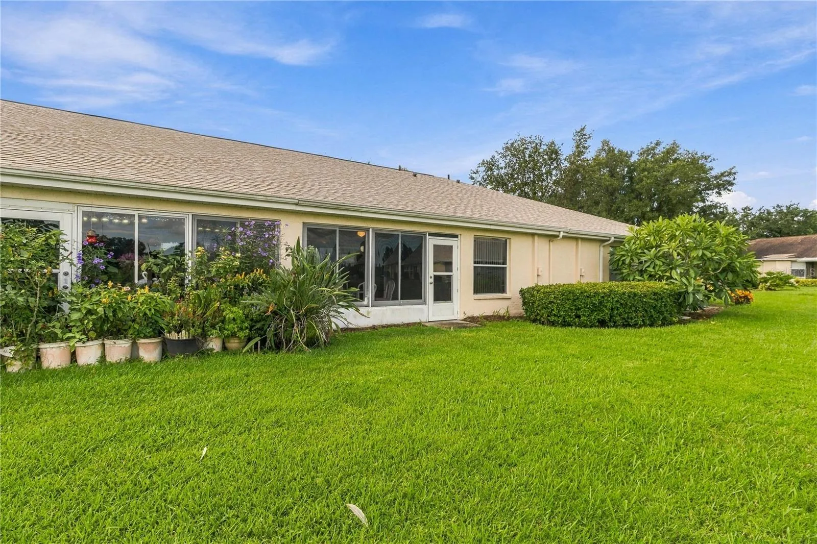 Take in the peaceful setting from the back of the home, overlooking the pond and backyard