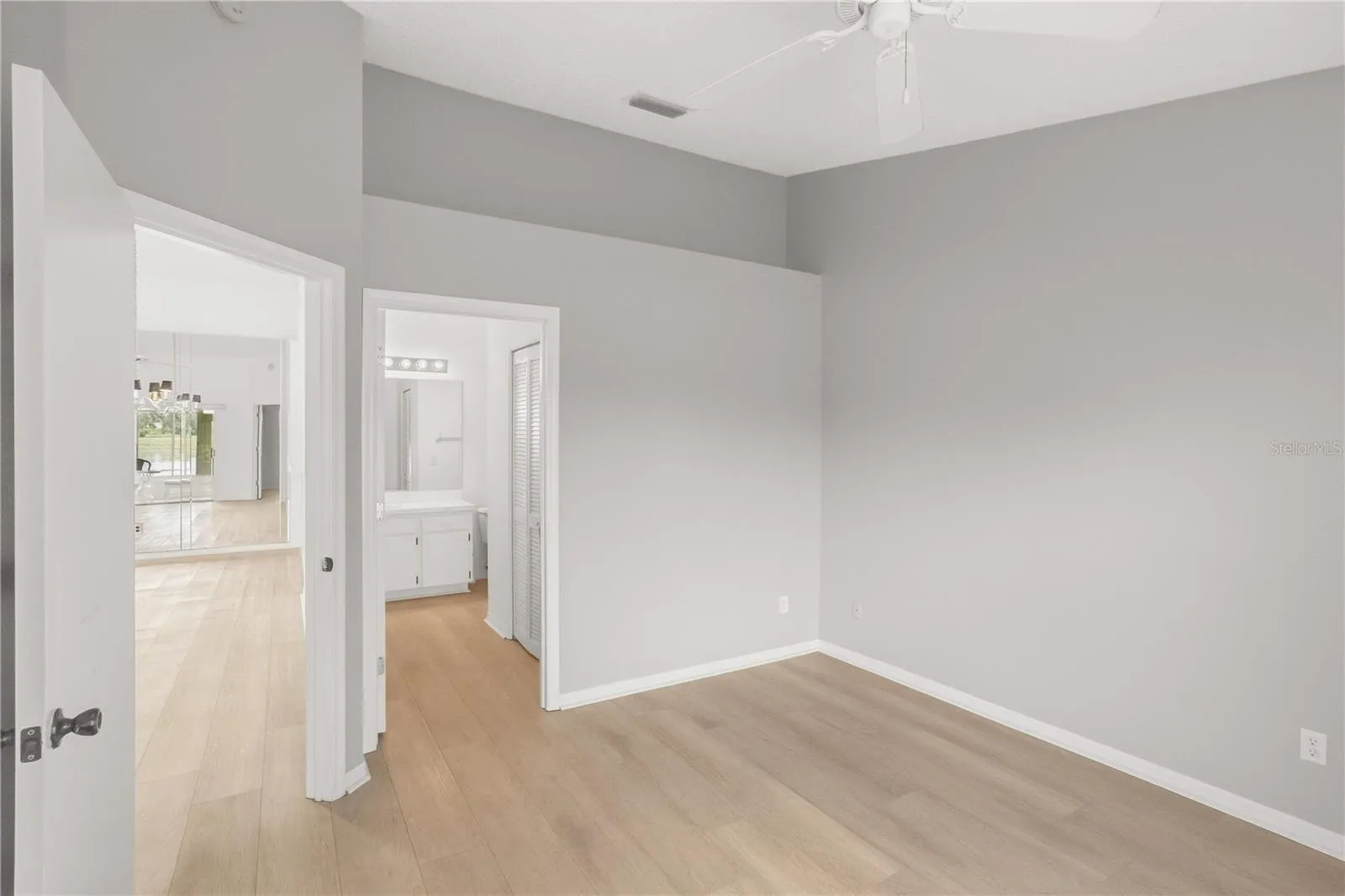 Spacious bedroom tucked away at the back of the home