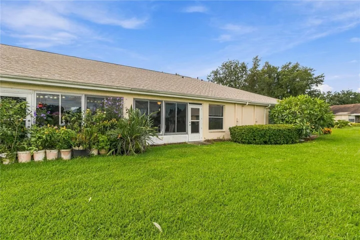 Take in the peaceful setting from the back of the home, overlooking the pond and backyard