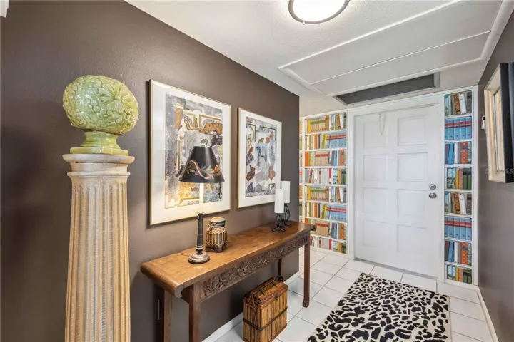 Hallway to 1/2 bath to the left