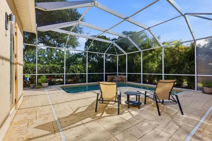 Oversized caged pool and patio