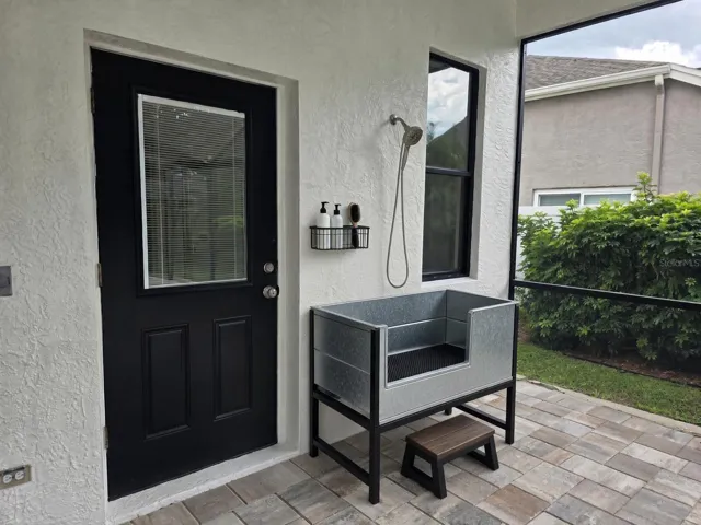 Staged outdoor shower.