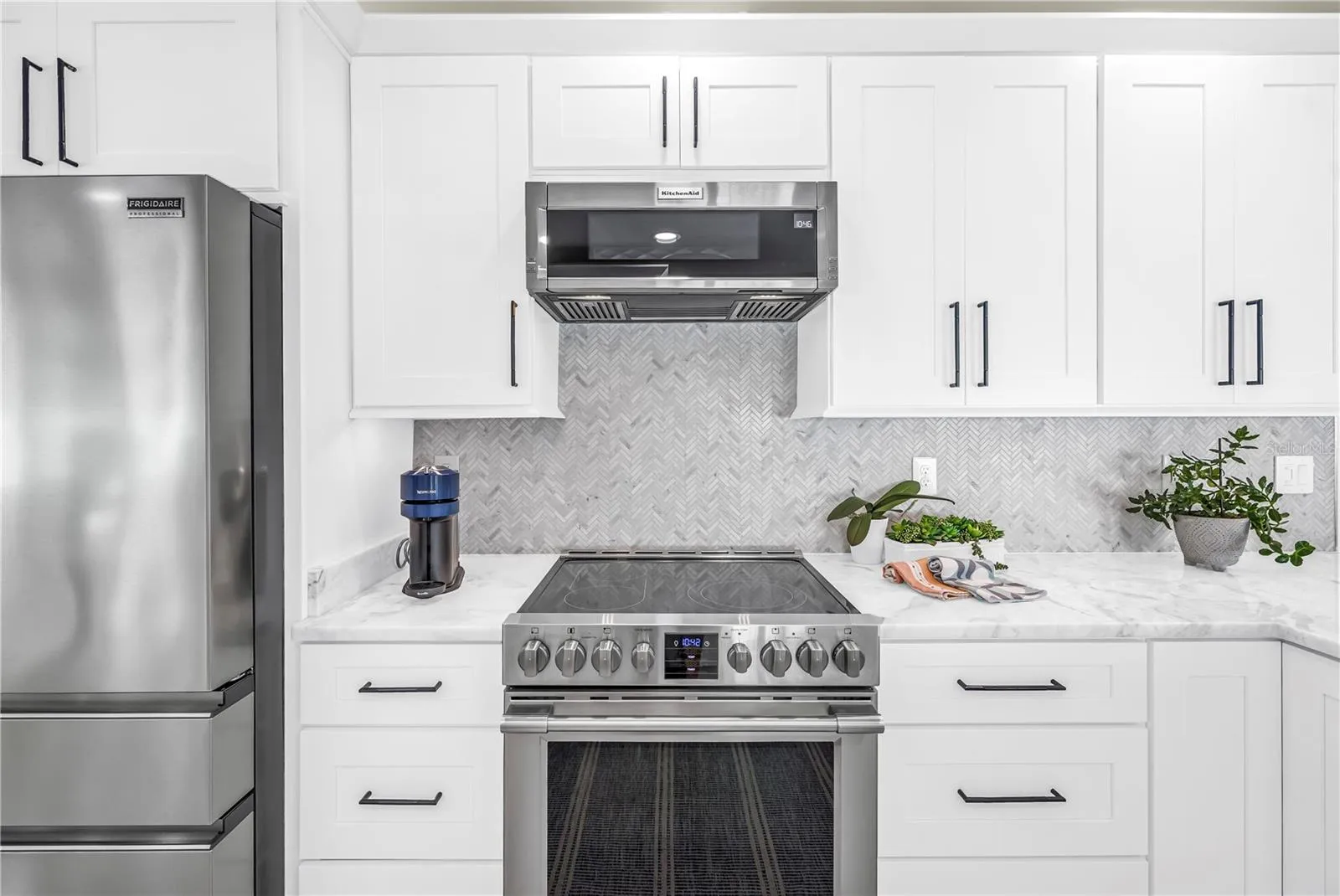 Sleek slimline vented microwave can easily be lowered for "petite" cooks.