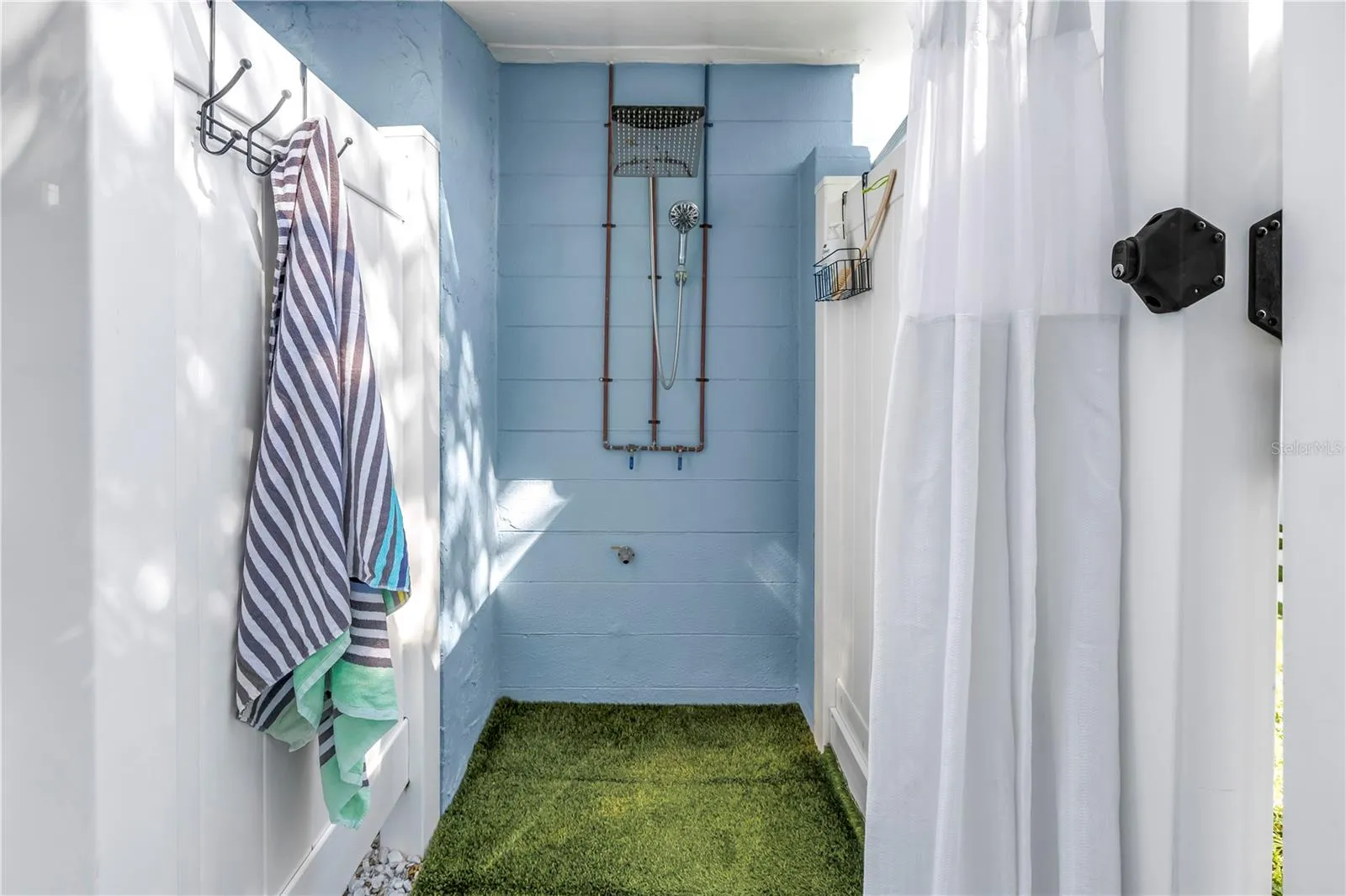 Outdoor shower with hot and cold water options!