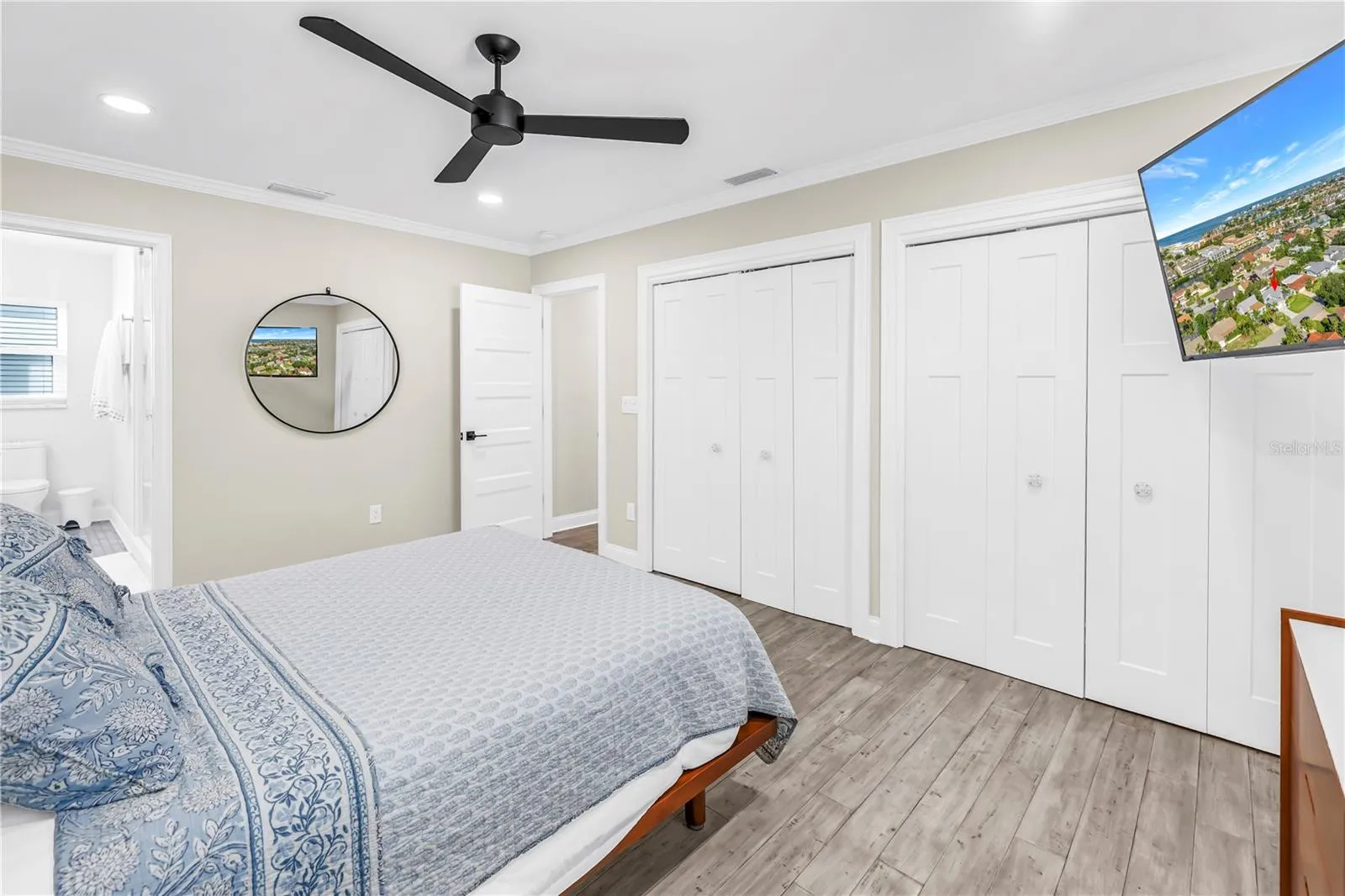 Double closets in Primary Suite with custom built in organizers.
