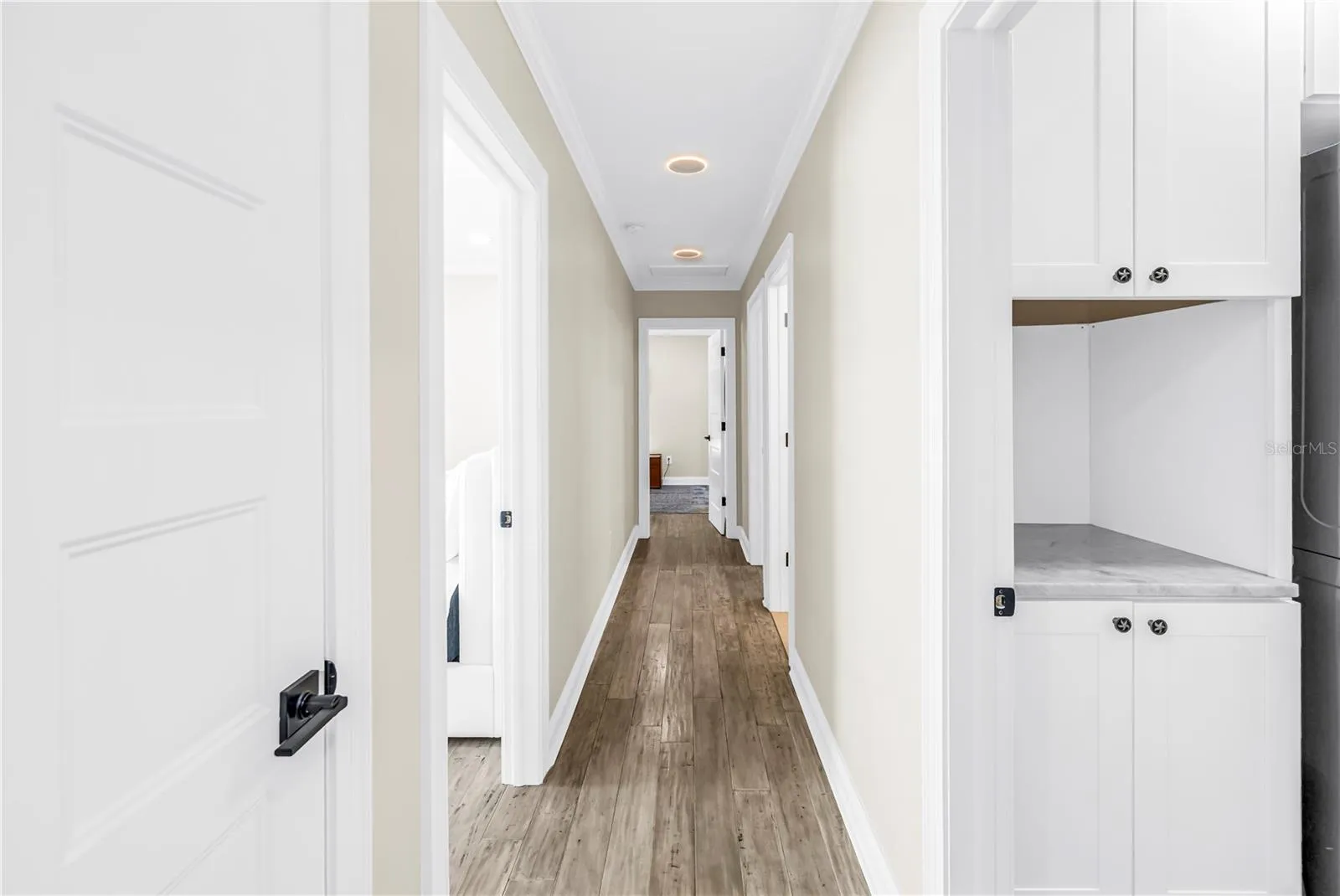 Low- Glow nightlight setting on recessed lighting in bedrooms and hallway. It lights from underneath for a glow that makes walking around at night safe and easy.