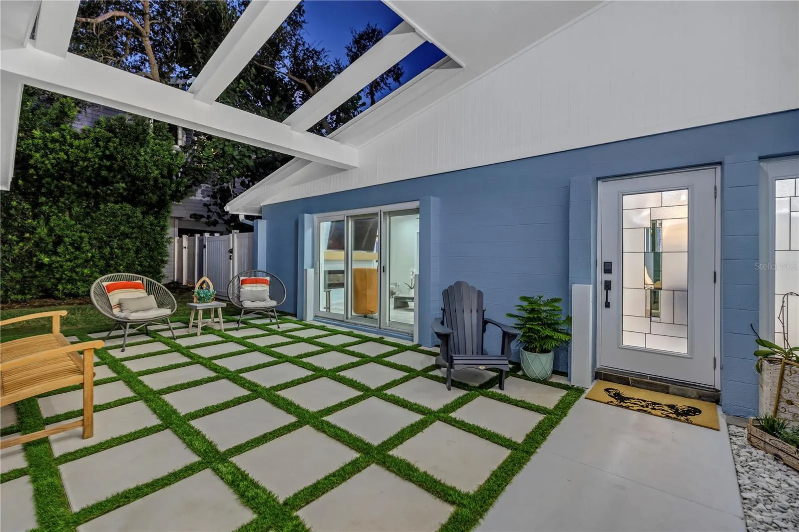 24 x 24 block pavers accented with astro turf.
