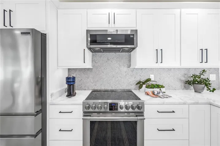 Sleek slimline vented microwave can easily be lowered for "petite" cooks.