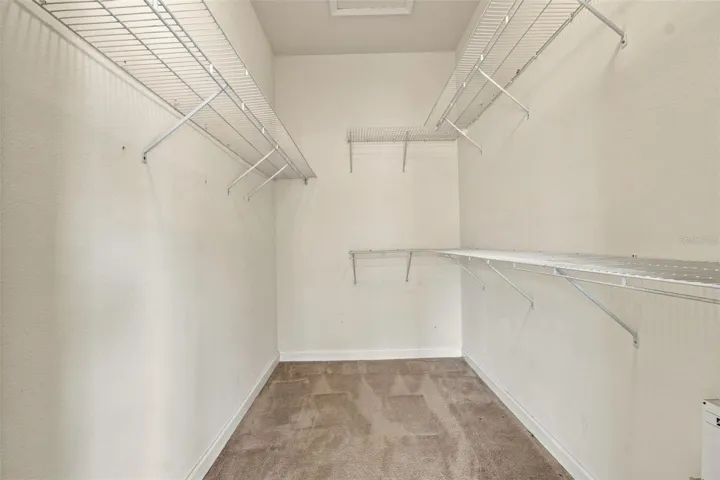 You will enjoy your walk in closet with plenty of storage.