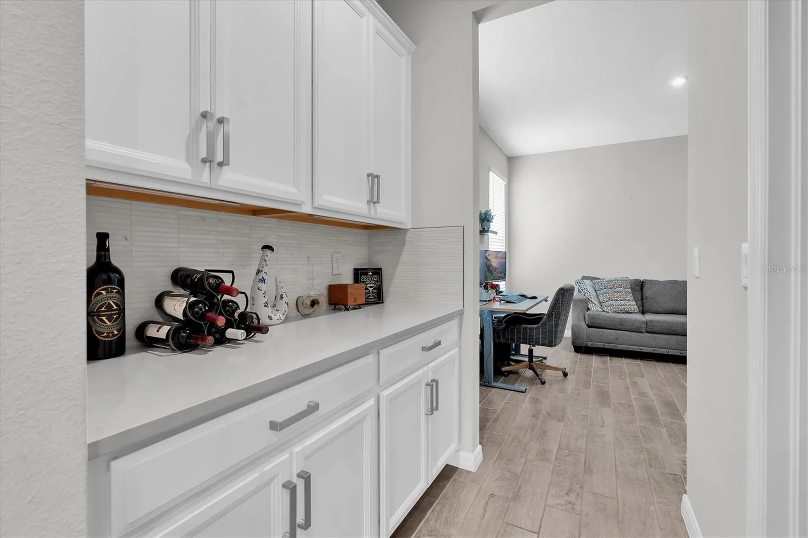 BUTLERS PANTRY ADJACENT TO LARGE WALK IN PANTRY