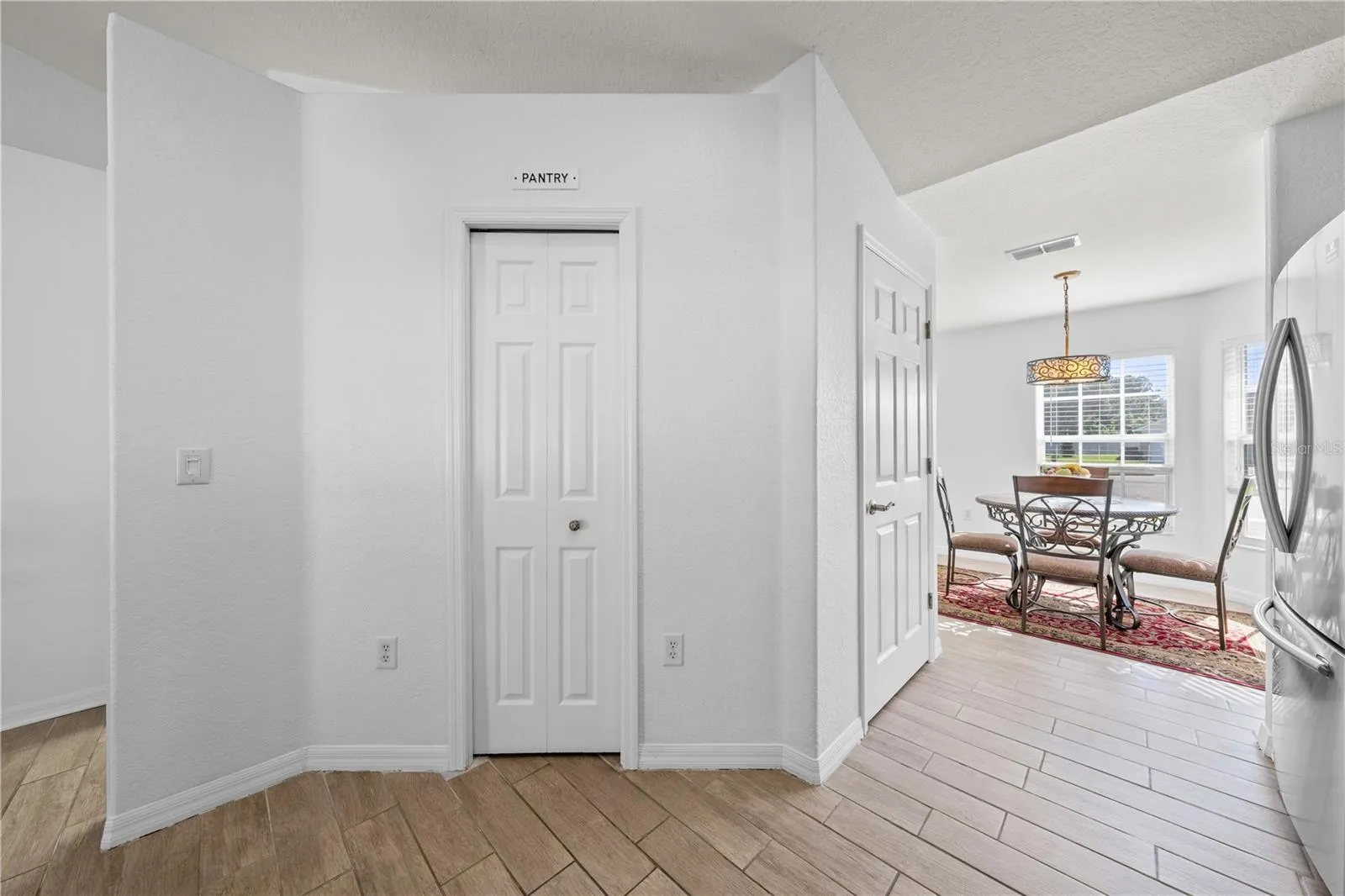 Dining Room From Kitchen and Kitchen Pantry