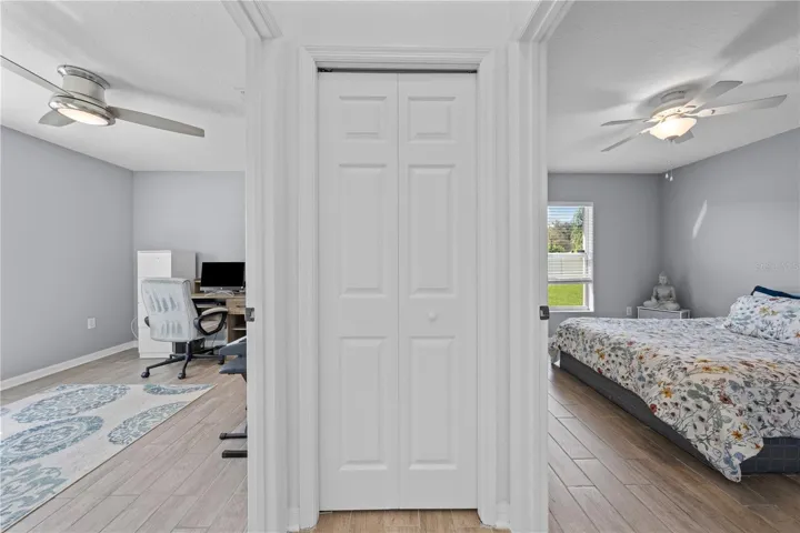 View to bedrooms from hallway. linen closest