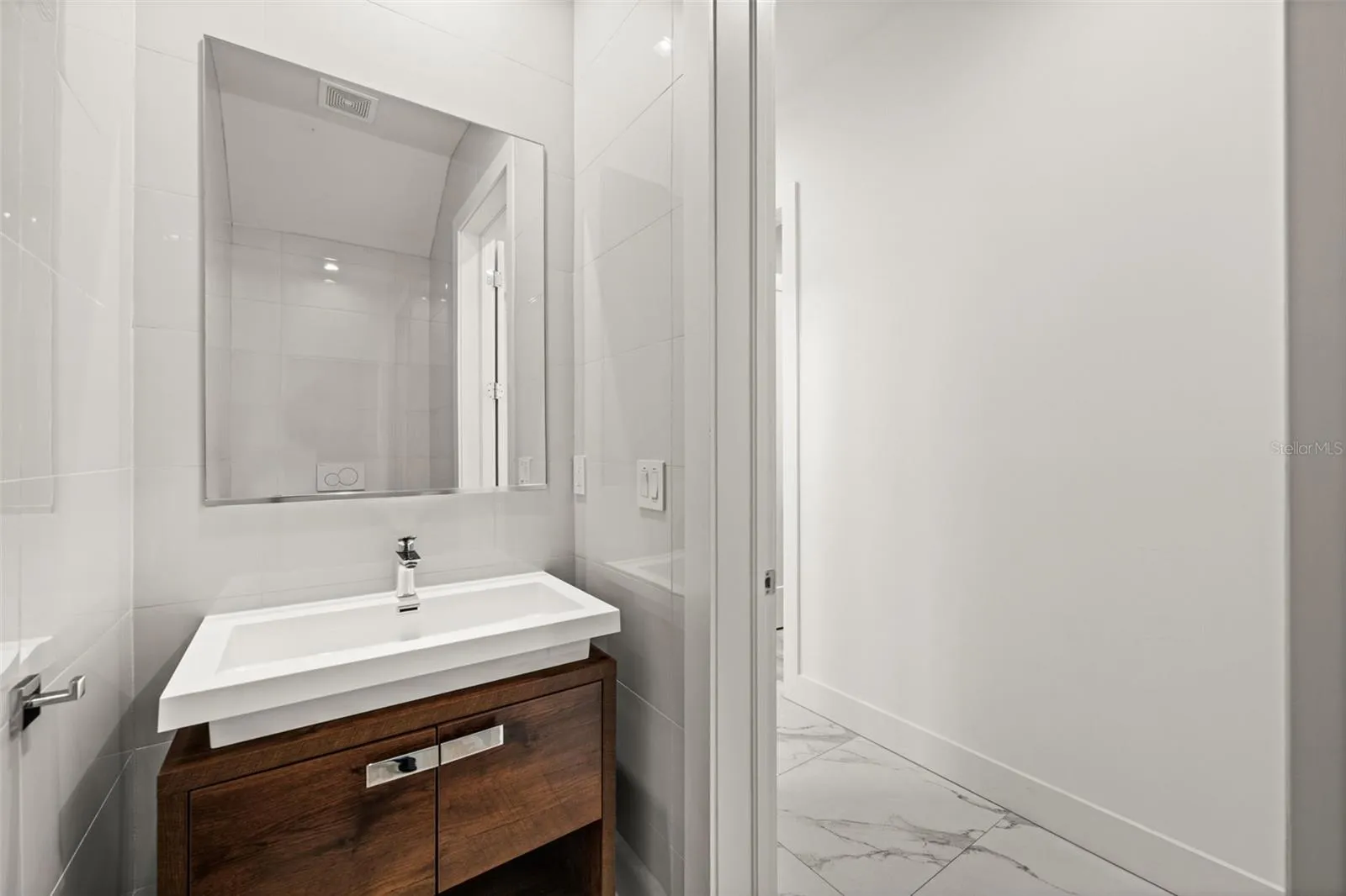 1st floor lavatory adjacent to the laundry room