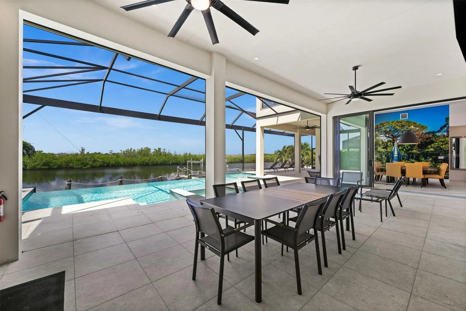 Huge covered lanai overlooking the pool and preserve