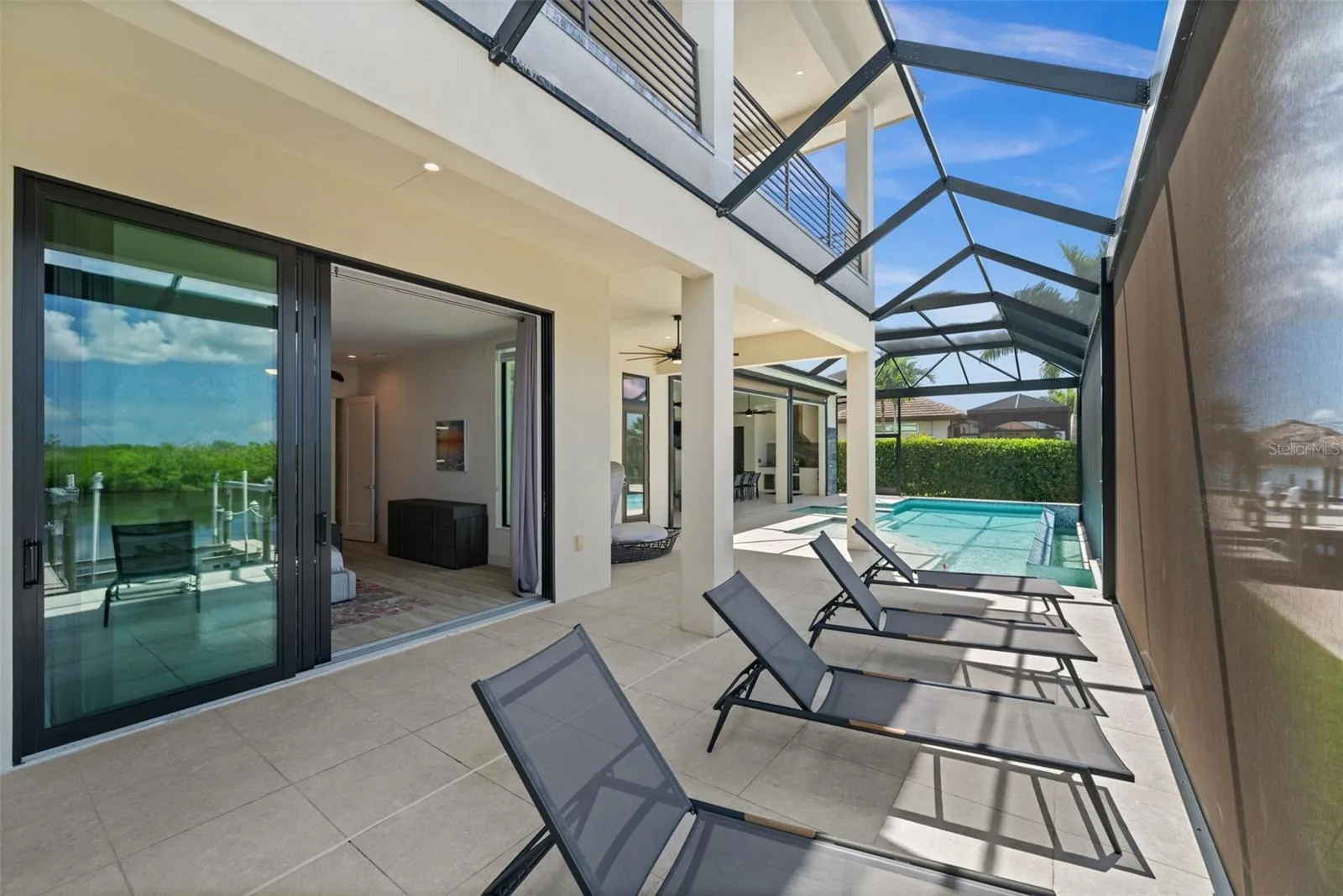 Lots of room for lounging on the screened patio