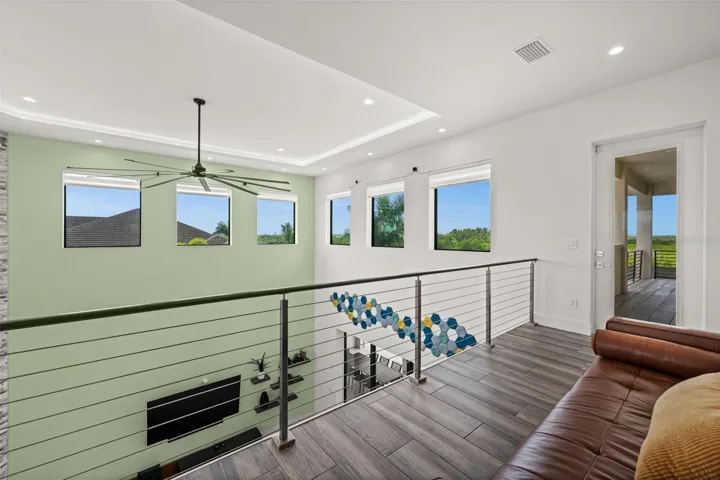 Loft with door to 2nd story balcony