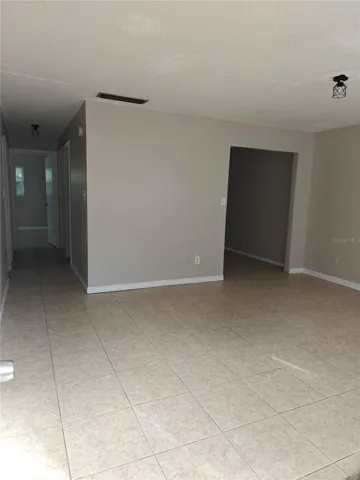 Side B Living room, small doorway to right is the den/office