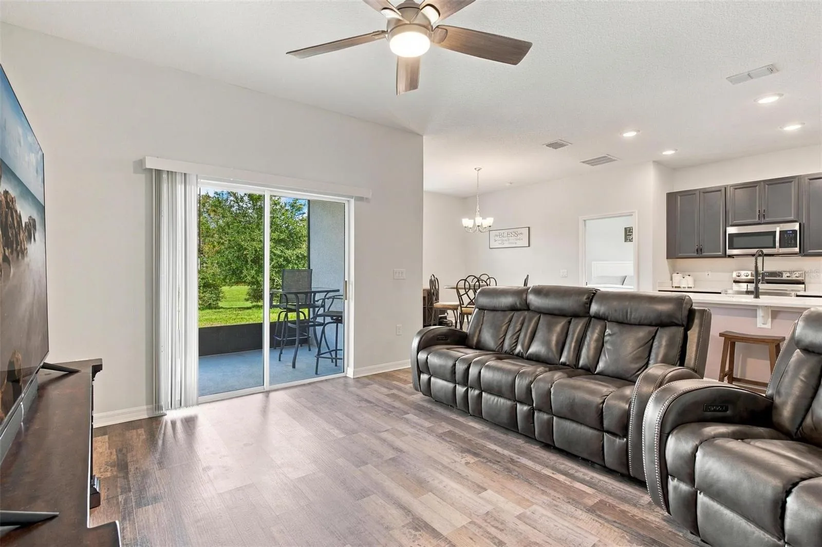 Great room with sliding glass doors leading to more seating!