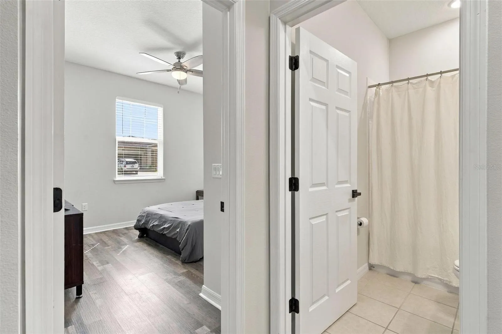 Bedroom 1, and bathroom with tile flooring!