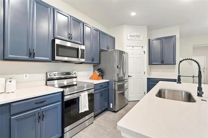 Kitchen full with appliances.