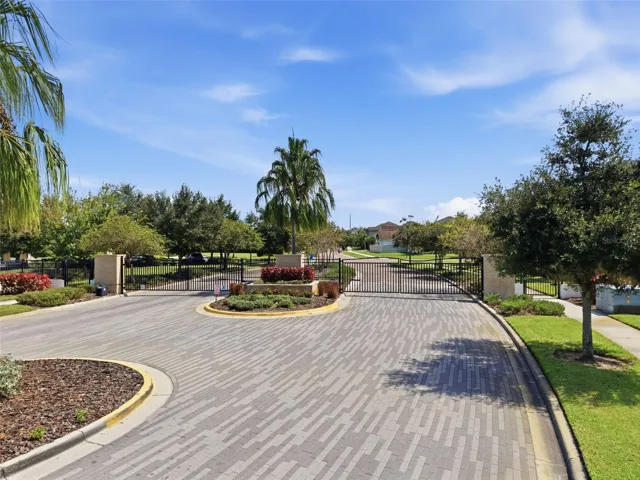 Paver gated entrance drive into Mariposa