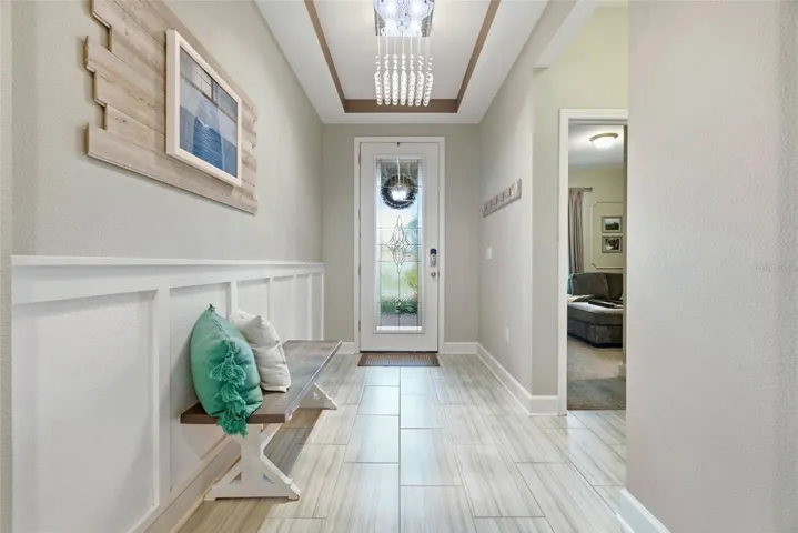 Elevated design details continue down the main hallway, leading naturally into the main living areas