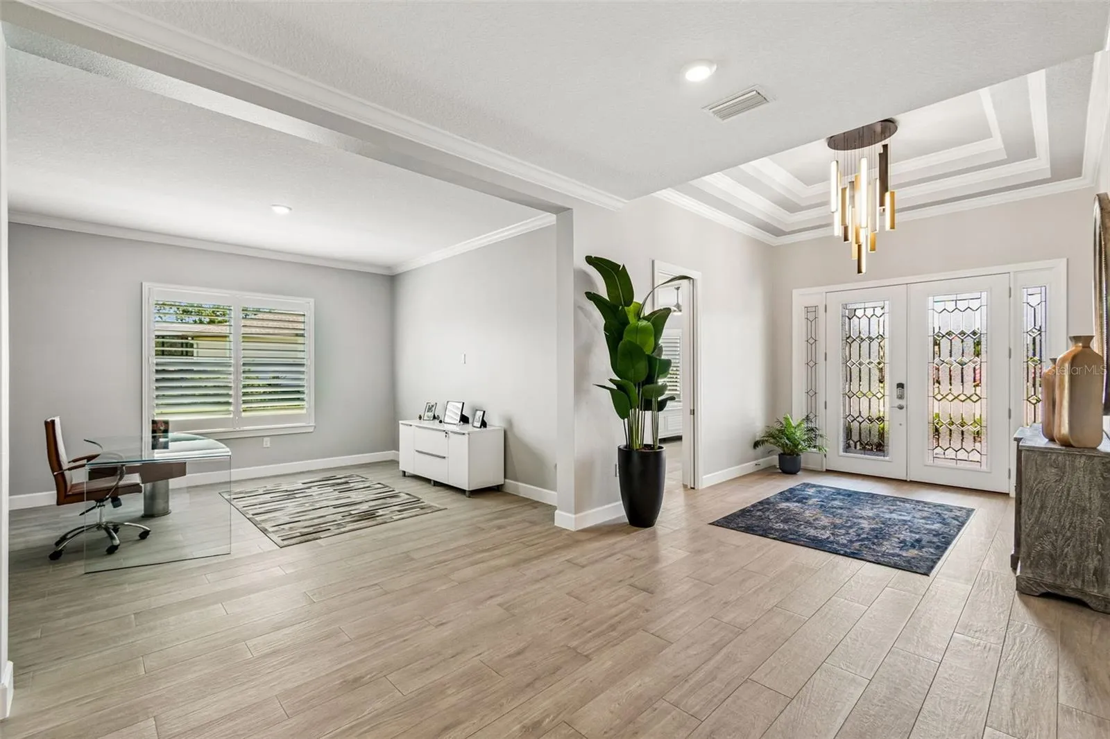View of Den &amp; Foyer with Tray Ceiling