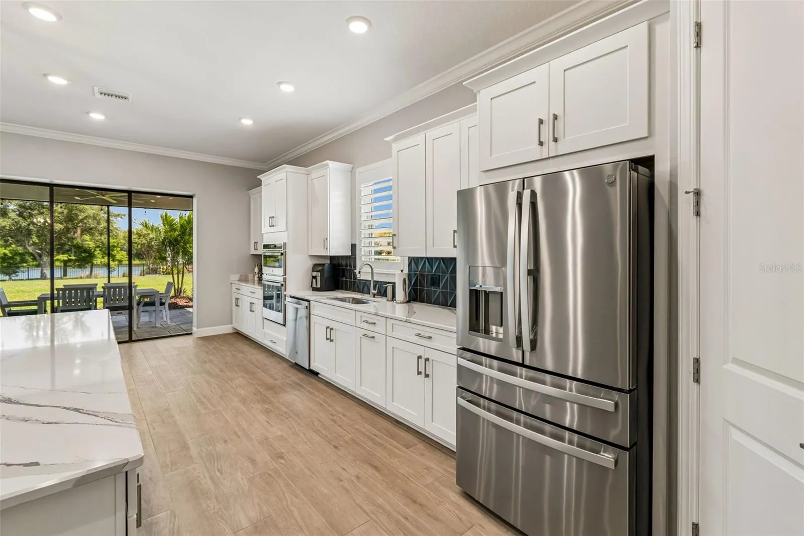 Kitchen View to the Covered LANAI