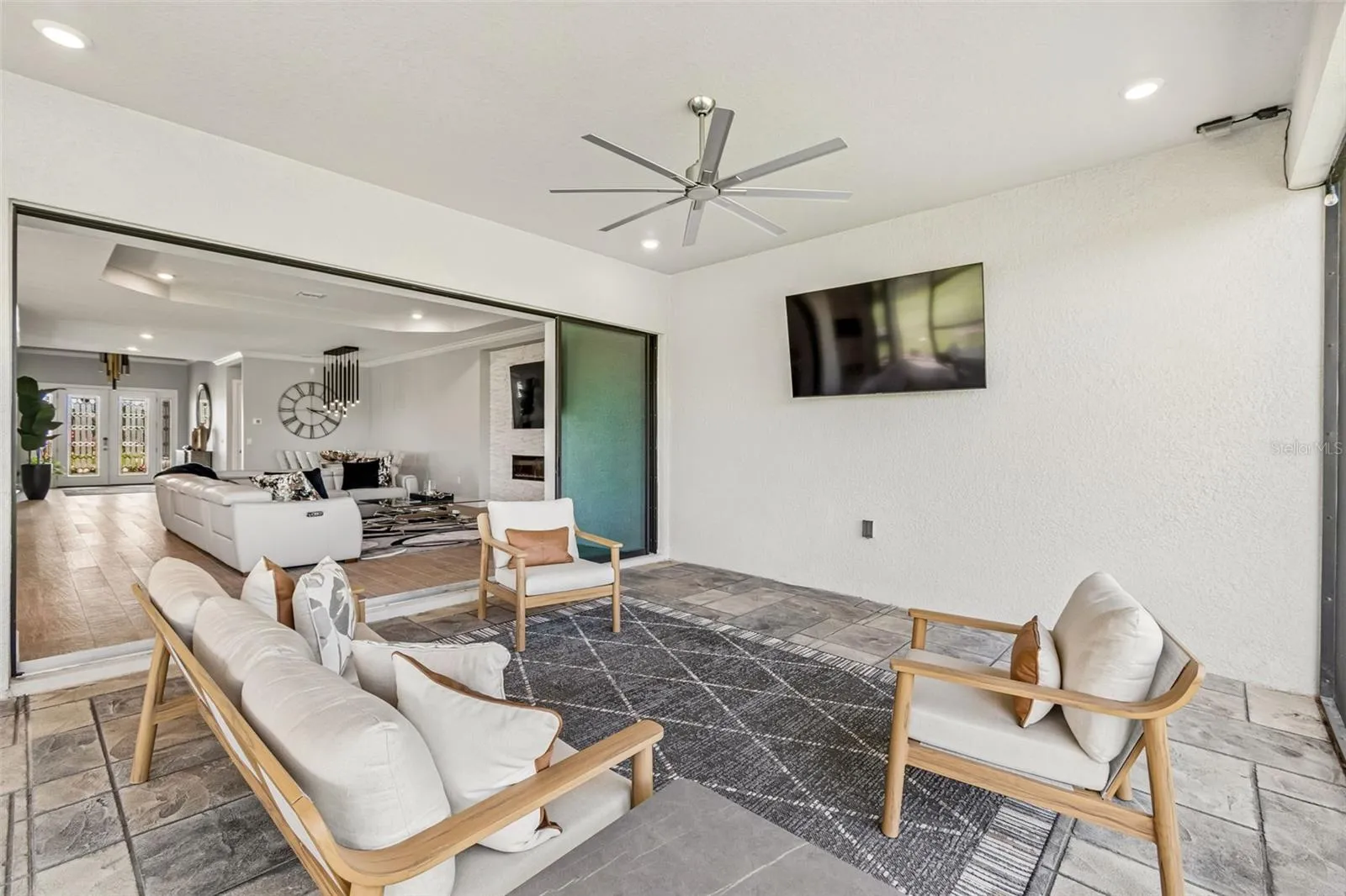 View of Pocketing Sliding Glass Doors &amp; Ceiling Fan