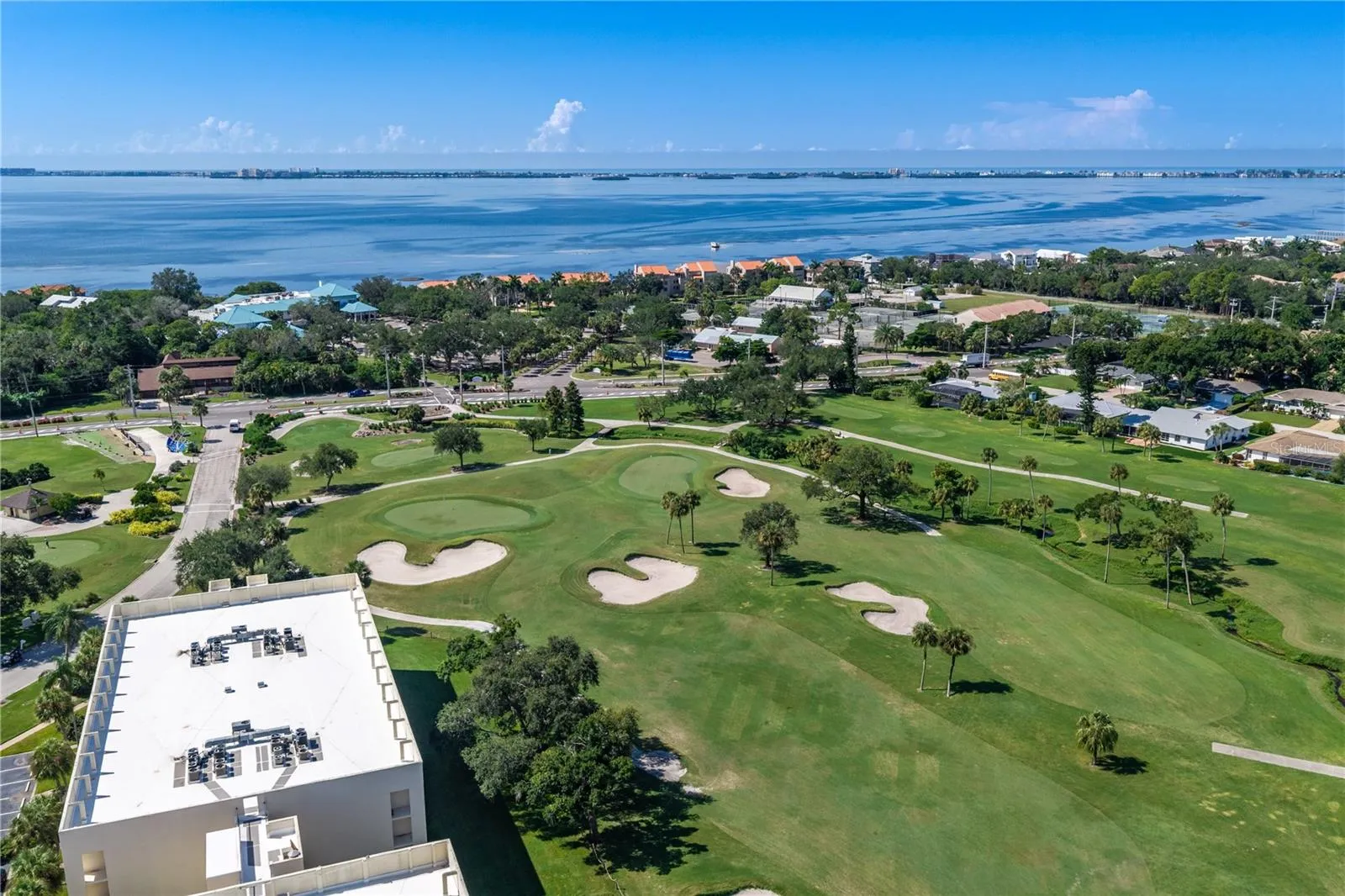 View of condo with golf course and proximity to Sarasota Bay