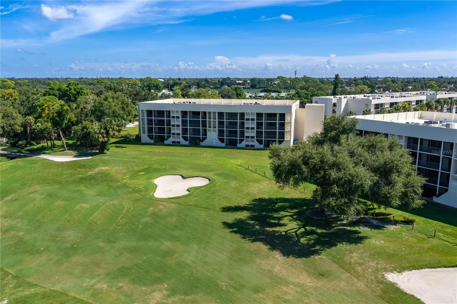 First floor condo located on 9th hole of IMG golf course