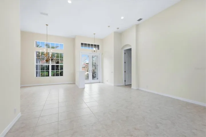 Front Entry / Formal Dining / Door to Primary Room