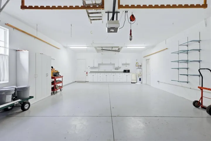 Large Garage with Cabinets / Shelving