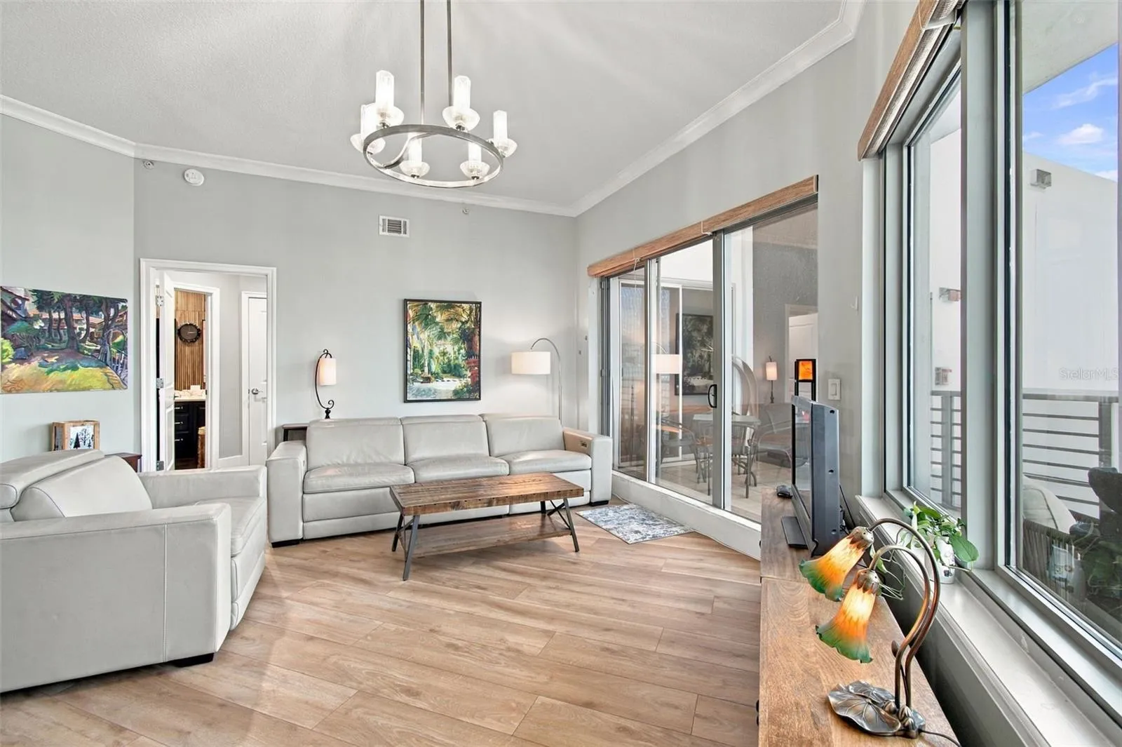 Spacious living with triple 8' sliders opening to your 5th floor Terrace