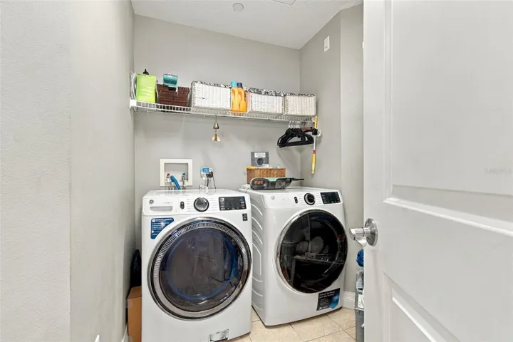 Laundry off Kitchen with extra storage