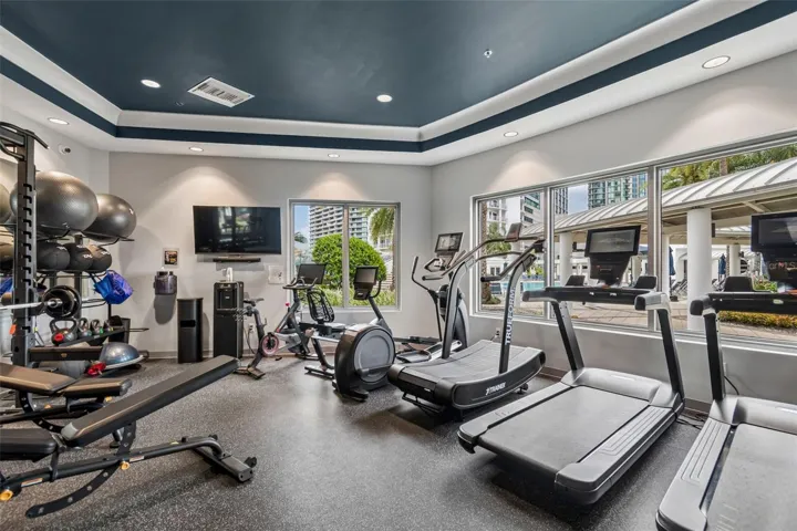 New gym overlooking the beautiful pool area