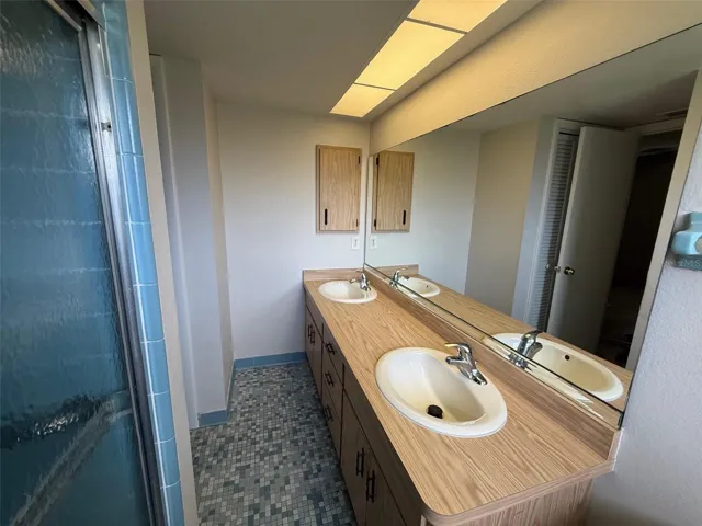 Master Bathroom with shower and dual sinks