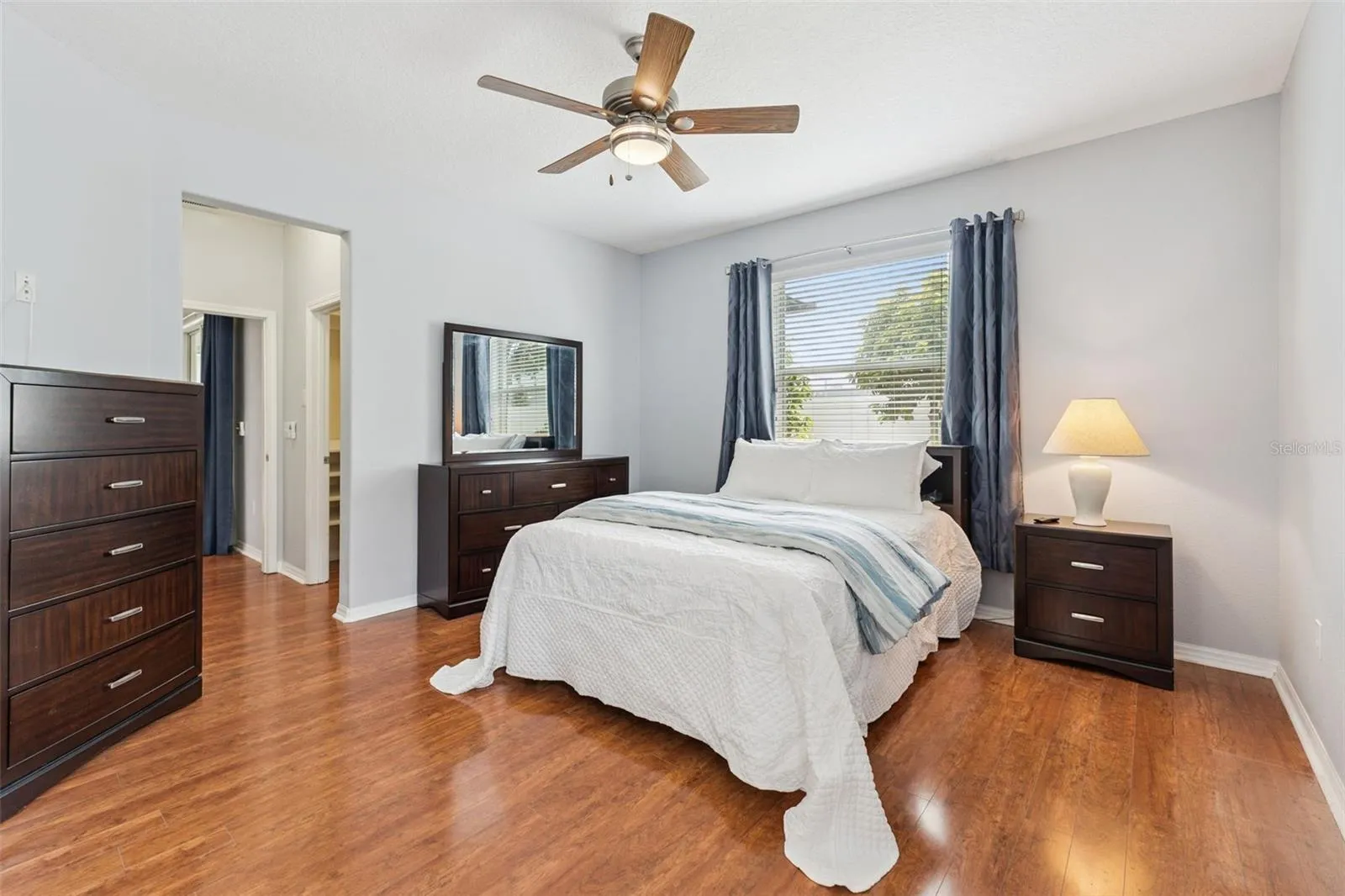 Primary Bedroom with upgraded ceiling fan that includes a remote control