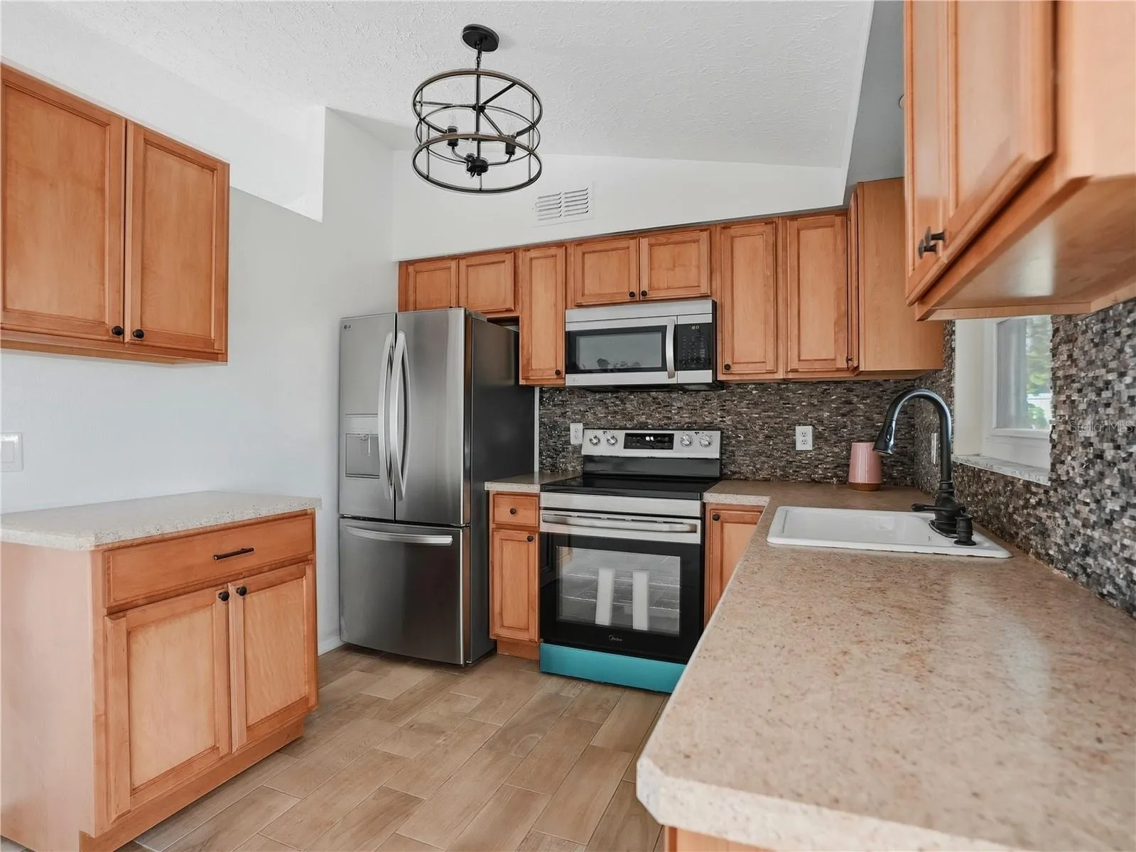 Kitchen with NEW appliances.