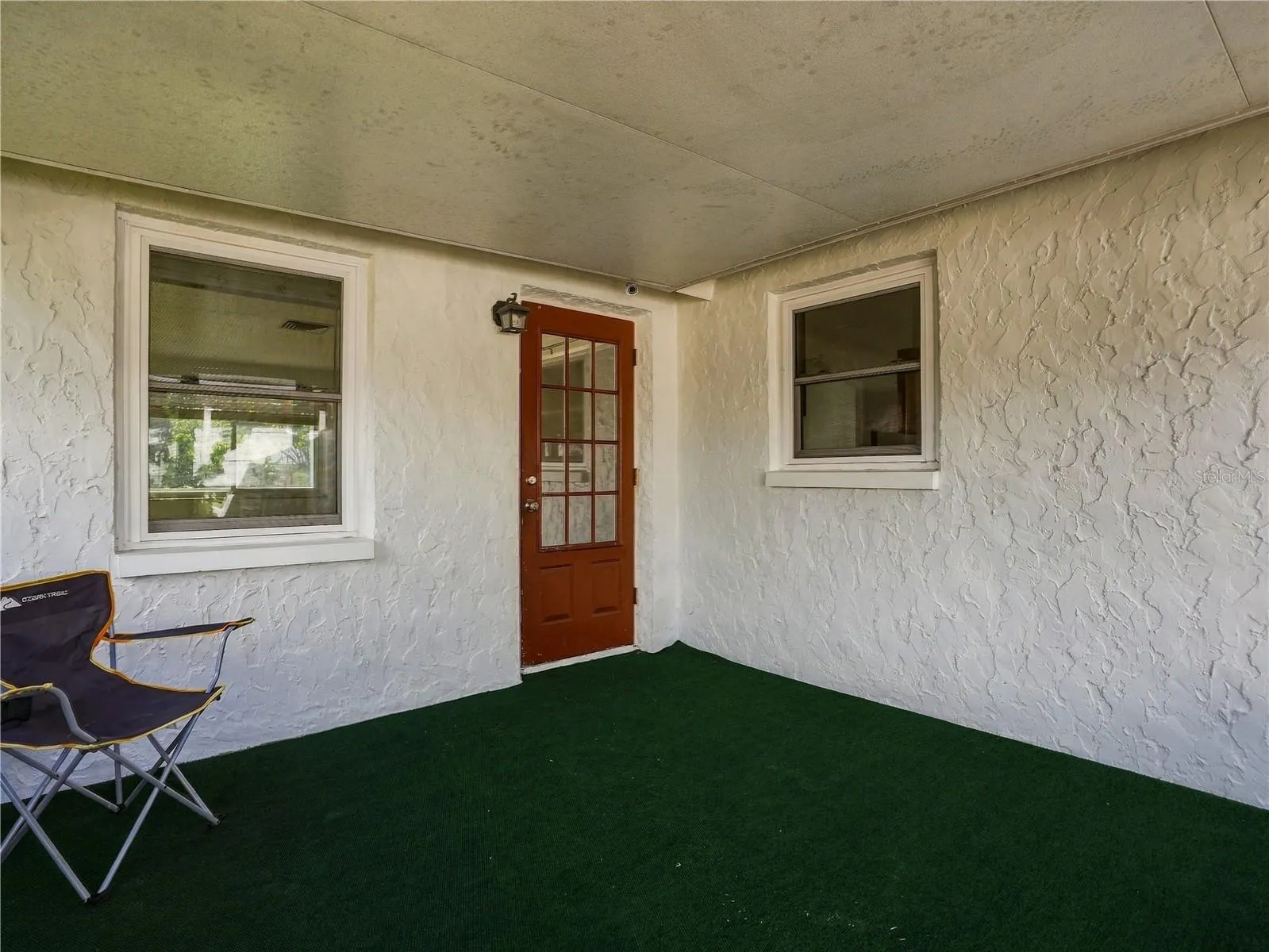 Covered screened porch.