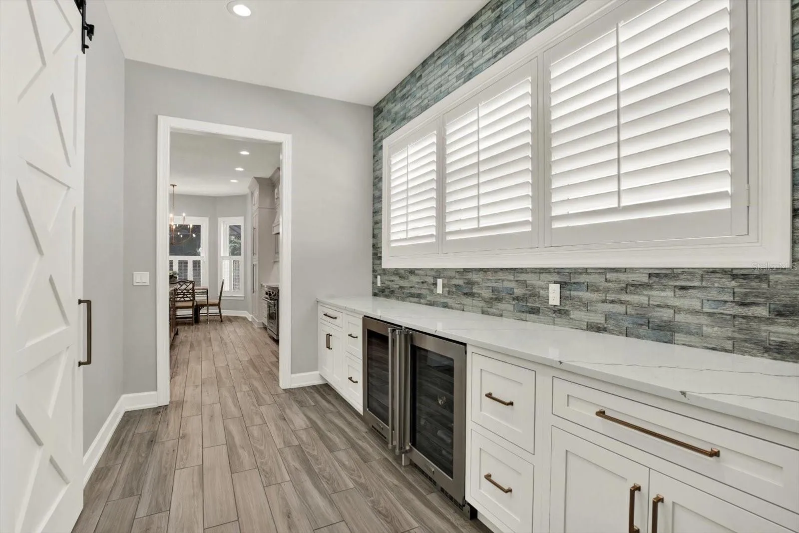 Butlers Pantry between kitchen and dining room
