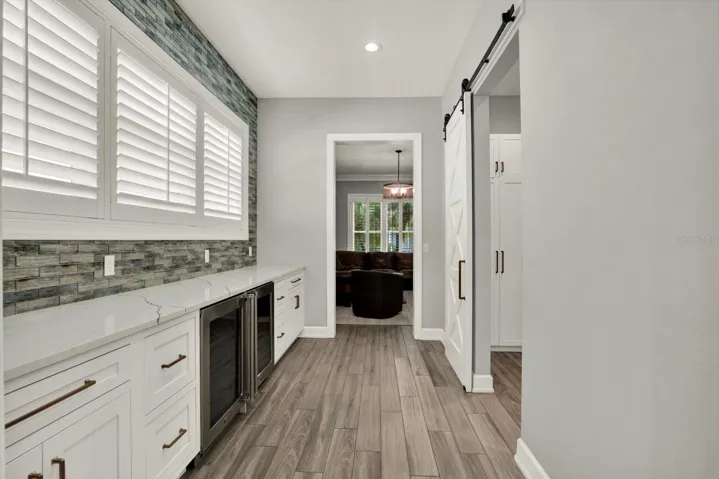 Butlers Pantry between kitchen and dining room