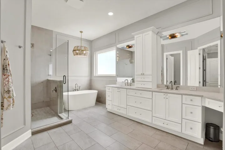 over sized (17x10) Primary Bath with soaker tub, separate shower, and private water closet