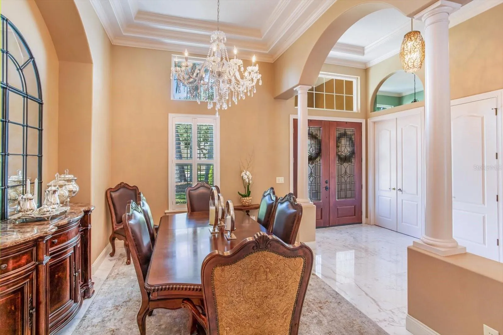 Dining Room with triple tray ceiling, chandalier and inset area for Dining Hutch
