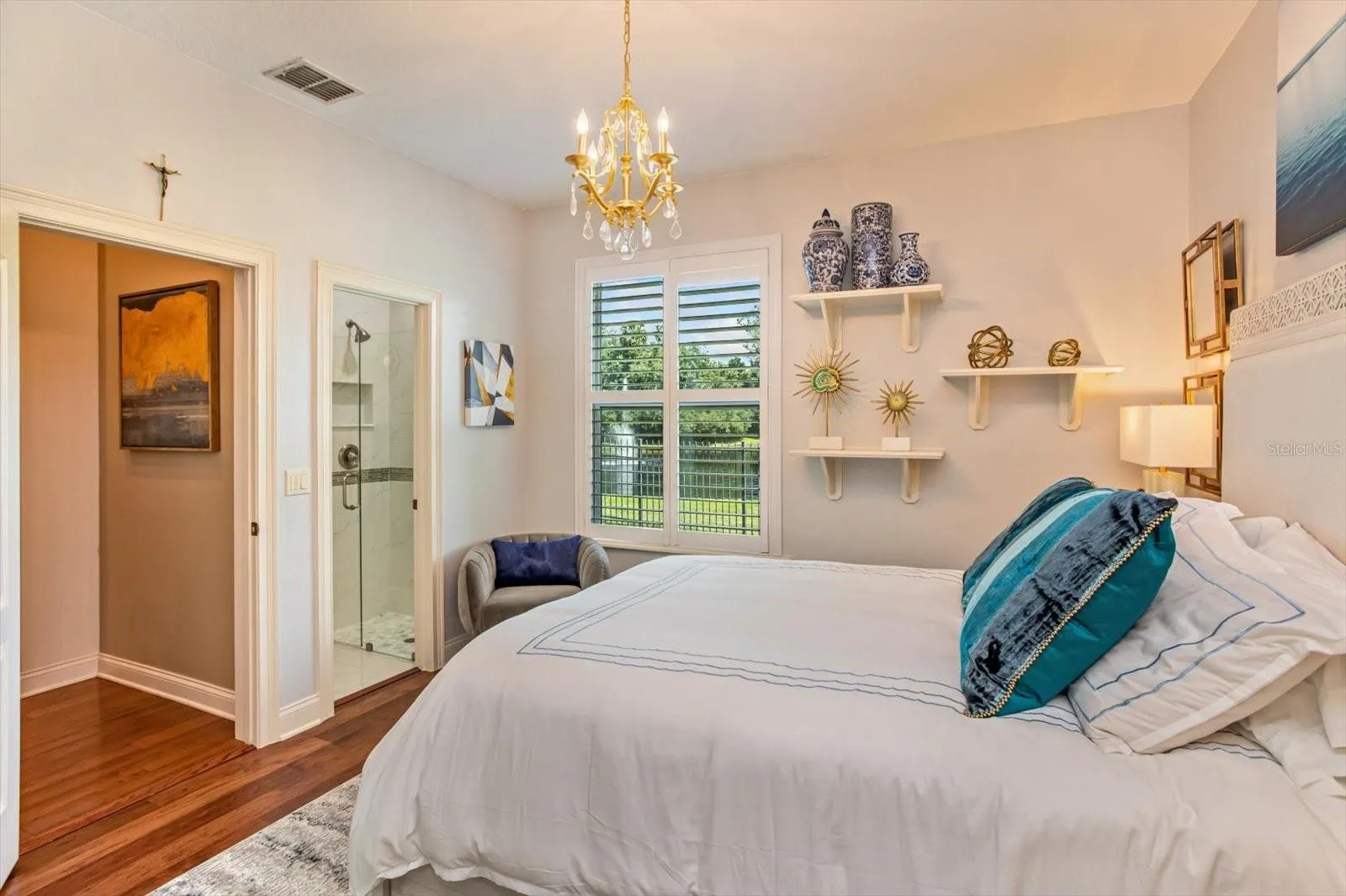 Bedroom 3 with Ensuite bathroom and view of Pond