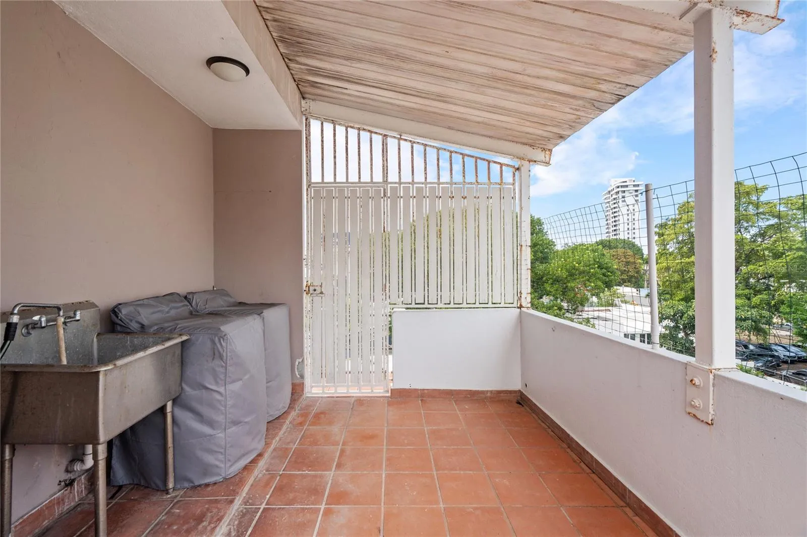 Laundry area and back terrace