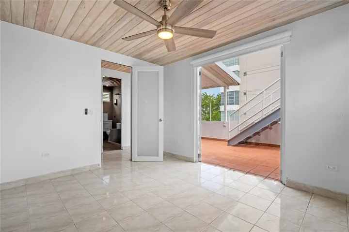Third bedroom and back terrace access