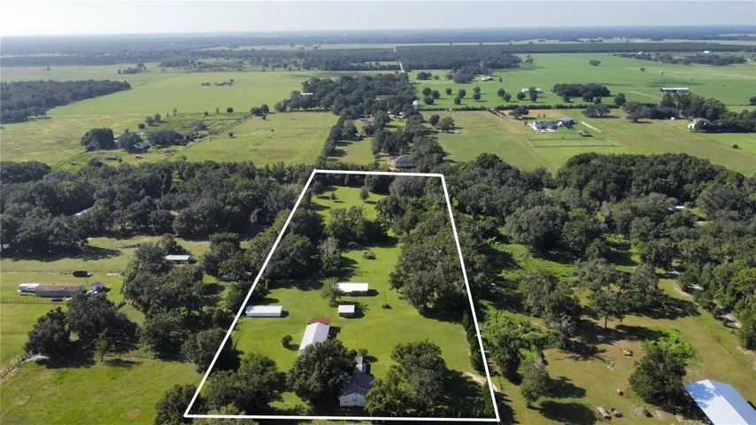 7.5 ac with 5 buildings. Outline is approximate.
