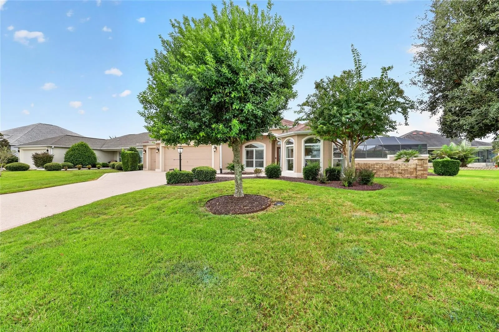 Mature Landscaping with Rock Mulch in Front